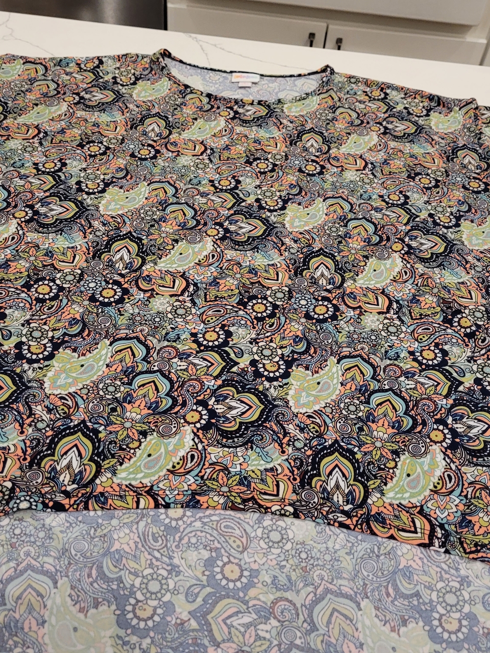LuLaRoe Navy Paisley Top with Pastel Accents